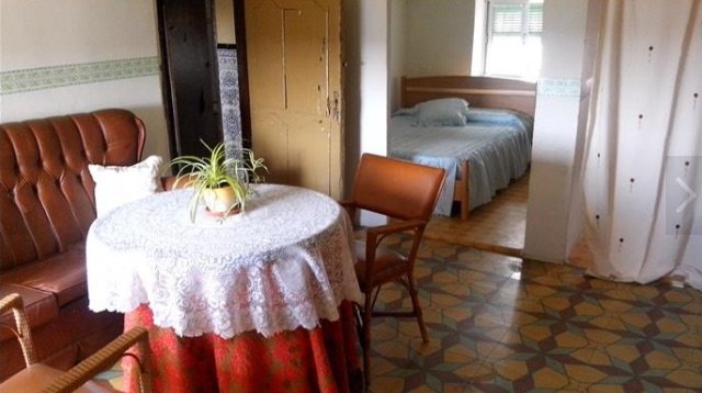 Salita con habitación al fondo
